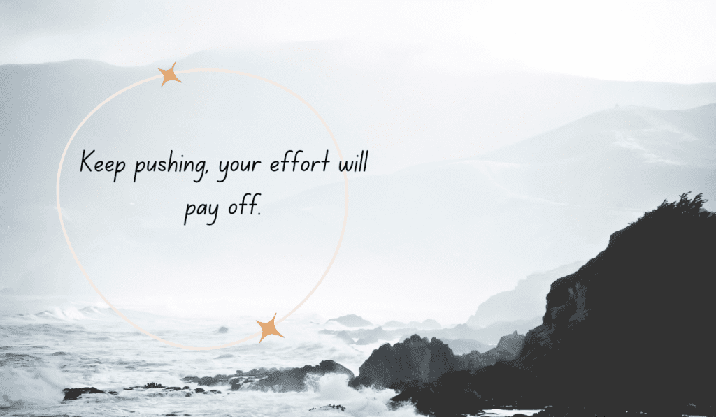 Black and white landscape photograph of crashing ocean waves against rocky cliffs with the perseverance quote, "Keep pushing, your effort will pay off."