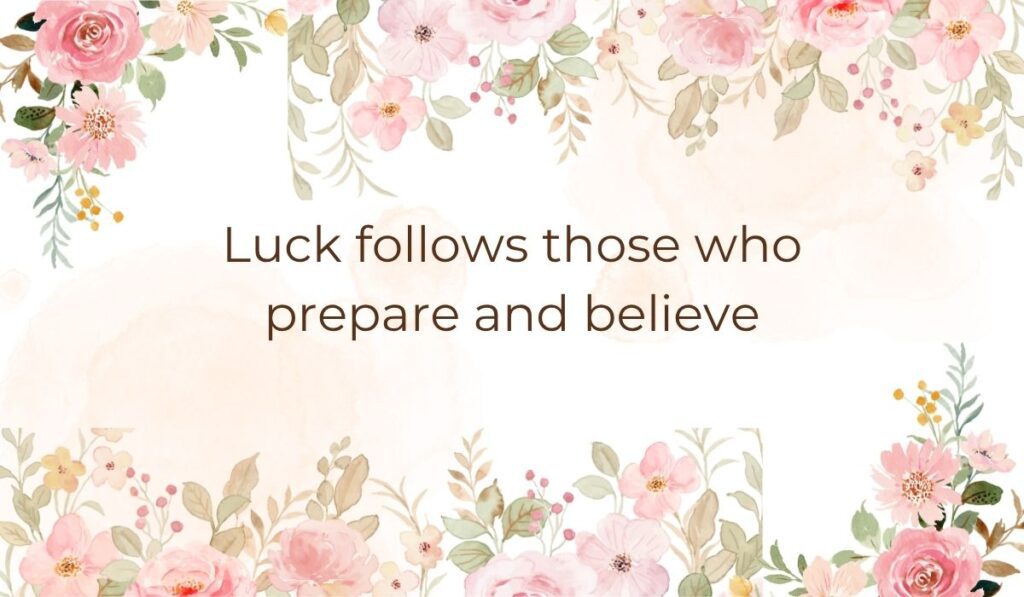 Elegant white card decorated with soft pink watercolor flowers and green leaves along the top and bottom borders, highlighting the best quotes for good luck that read, "Luck follows those who prepare and believe".