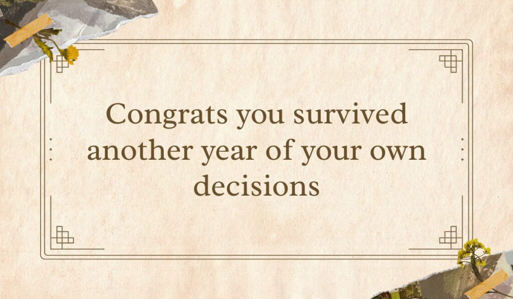 Vintage-style tan parchment card with a double line border and dried yellow floral collage details in the corners, framing comical birthday wishes for a guy funny: "Congrats you survived another year of your own decisions".