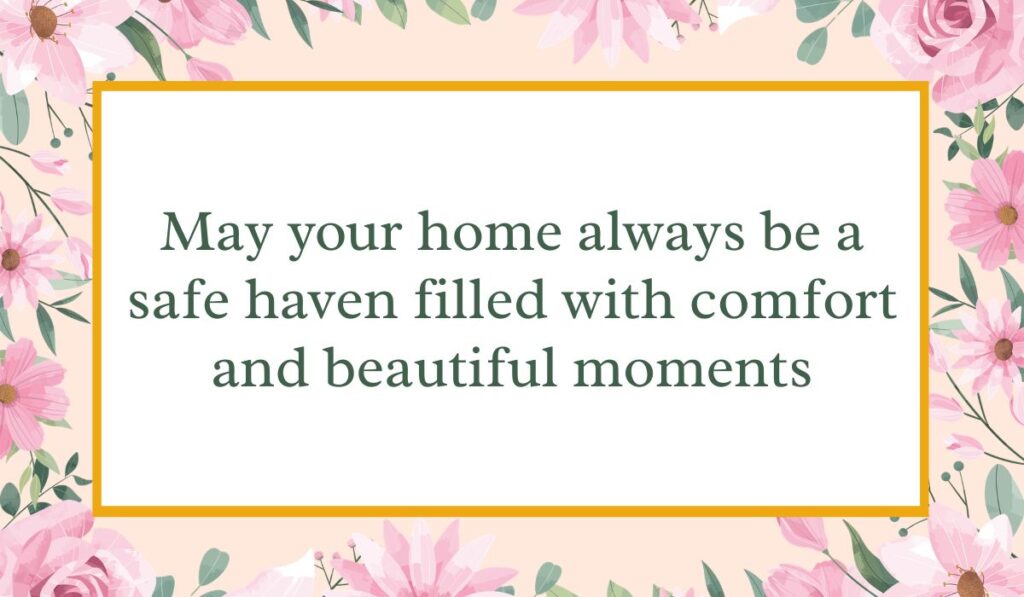 Bright white card enclosed by an elegant border of pink watercolor roses and green leaves with a thin gold inner frame, displaying a heartfelt congratulations message for a new home: "May your home always be a safe haven filled with comfort and beautiful moments".