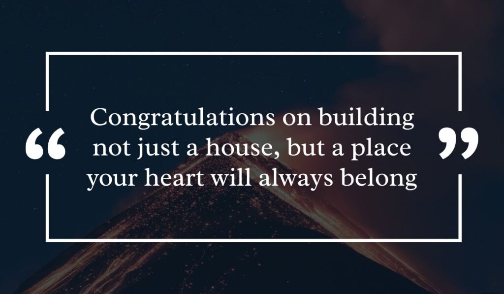 Dramatic dark night sky background featuring a lit volcanic peak at night, centered with a white quotation box highlighting an inspiring congratulations message for a new home: "Congratulations on building not just a house, but a place your heart will always belong".