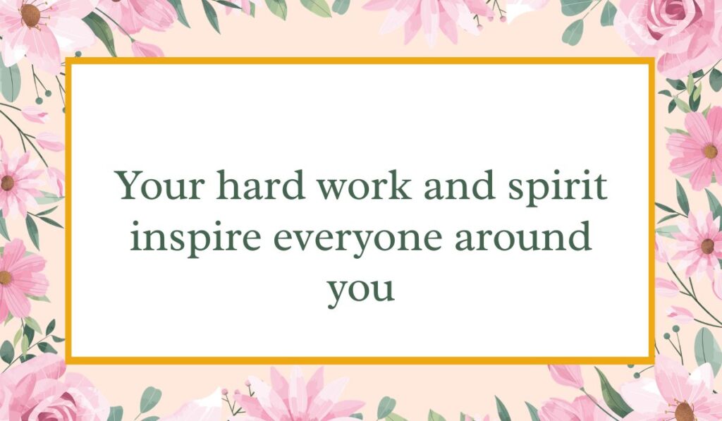 Bright white card enclosed by an elegant border of pink watercolor roses and green leaves with a thin gold inner frame, displaying uplifting happy birthday wishes for coworker: "Your hard work and spirit inspire everyone around you".