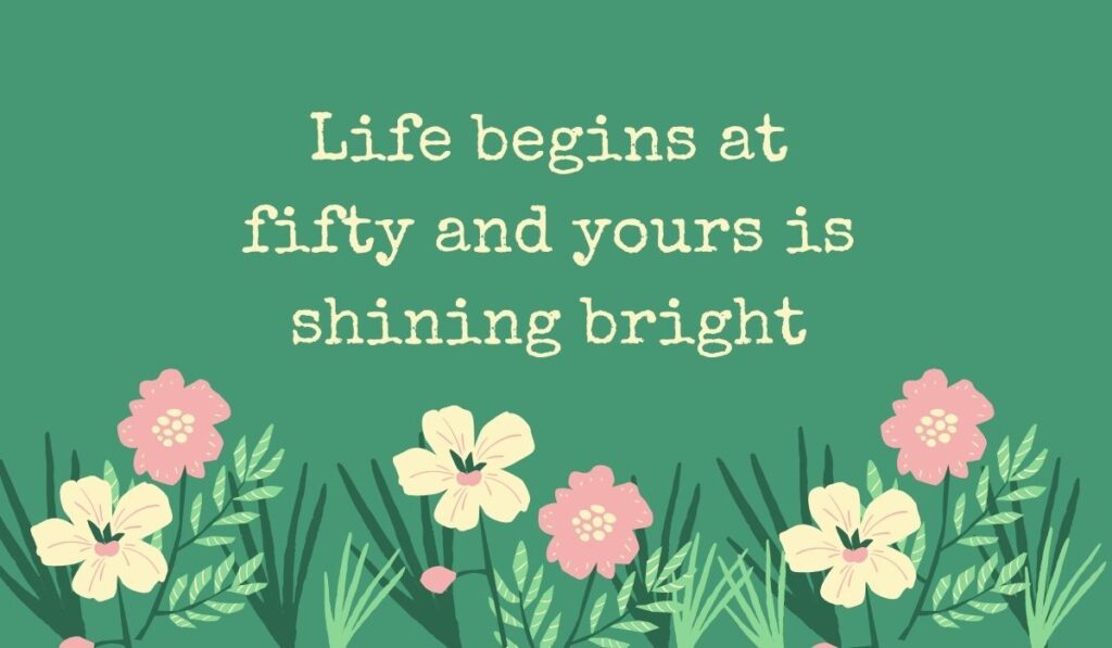 Deep sage green card featuring a row of simple pink and cream wildflowers along the bottom, displaying typed, uplifting quotes for 50th birthday for woman: "Life begins at fifty and yours is shining bright".