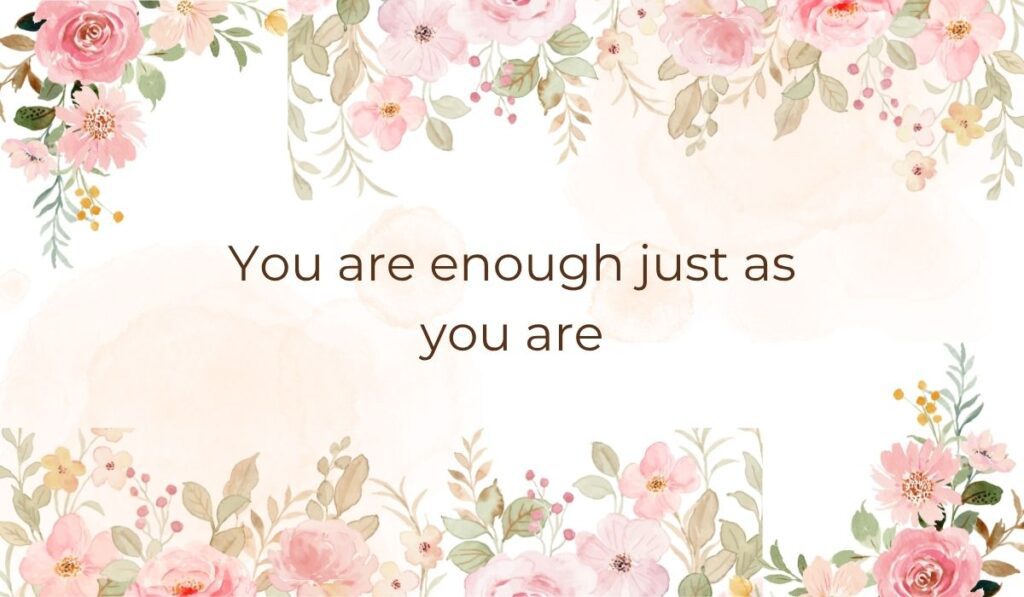Elegant white card bordered with soft pink watercolor florals and leaves along the top and bottom edges, highlighting a sentimental empowering graphic that reads, "You are enough just as you are".
