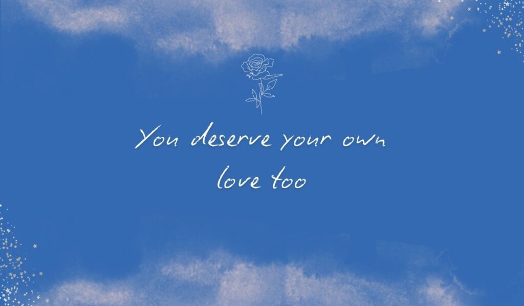 Rich royal blue watercolor background with subtle stardust detailing in the bottom corners and a fine white line-art rose centered at the top, framing the elegant handwritten sentiment, "You deserve your own love too".