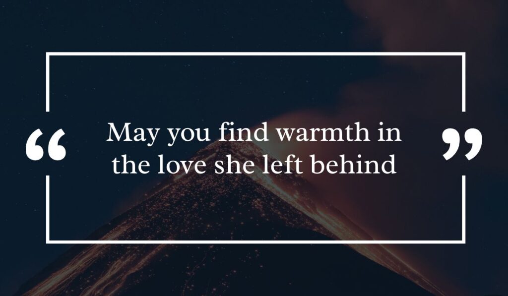 Dramatic dark night sky background featuring a lit volcanic peak at night, centered with a white quotation box highlighting a heartfelt short sympathy message for loss of mother: "May you find warmth in the love she left behind".