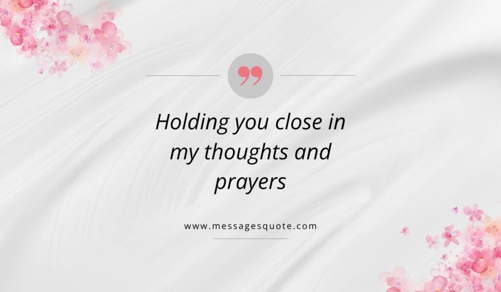 Luxurious draped white silk texture background with pink watercolor floral bouquets in the corners, showcasing a clean pink quotation icon above the beautiful phrase, "Holding you close in my thoughts and prayers" with the website branding www.messagesquote.com listed cleanly below.