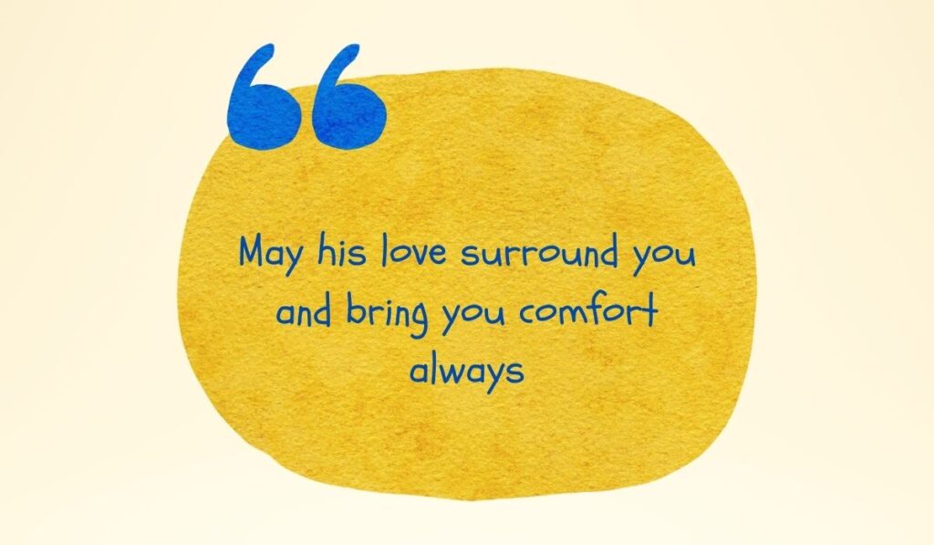 Vibrant textured golden-yellow watercolor circle accented by large painted blue quotation marks at the top left, spotlighting the inspirational quote, "May his love surround you and bring you comfort always" written in a playful blue font.
