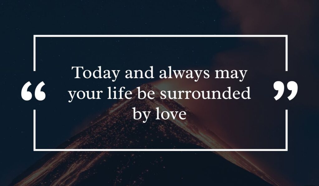 Dramatic dark night sky background featuring a lit volcanic peak at night, centered with a white quotation box highlighting sincere valentine day wishes for everyone: "Today and always may your life be surrounded by love".