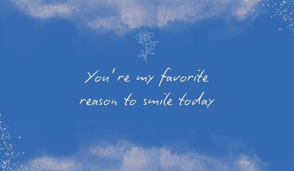 Rich royal blue watercolor background with subtle stardust detailing in the bottom corners and a fine white line-art rose centered at the top, framing the elegant handwritten sentiment, "You’re my favorite reason to smile today".