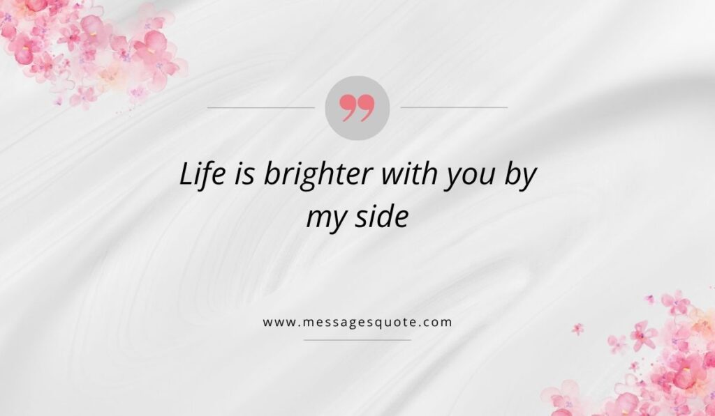 Luxurious draped white silk texture background with pink watercolor floral bouquets in the corners, showcasing a clean pink quotation icon above the beautiful phrase, "Life is brighter with you by my side" with the website branding www.messagesquote.com listed cleanly below.