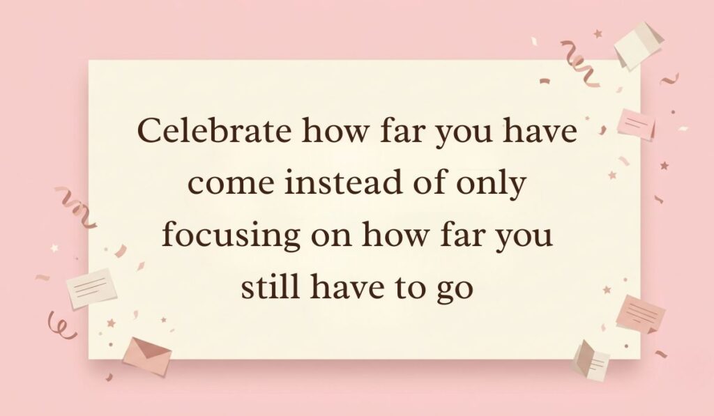 Soft pink background decorated with festive paper confetti, mini envelopes, and stars presenting be kind to yourself quotes reading, "Celebrate how far you have come instead of only focusing on how far you still have to go"