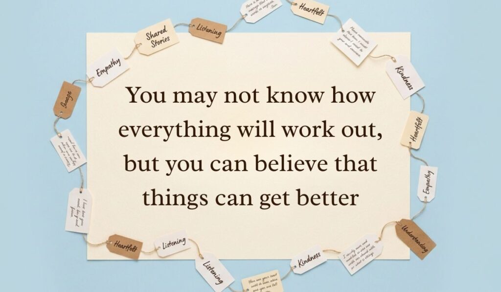 Soft blue surface decorated with a ring of string-bound message tags showcasing everything will be okay quotes reading, "You may not know how everything will work out, but you can believe that things can get better"
