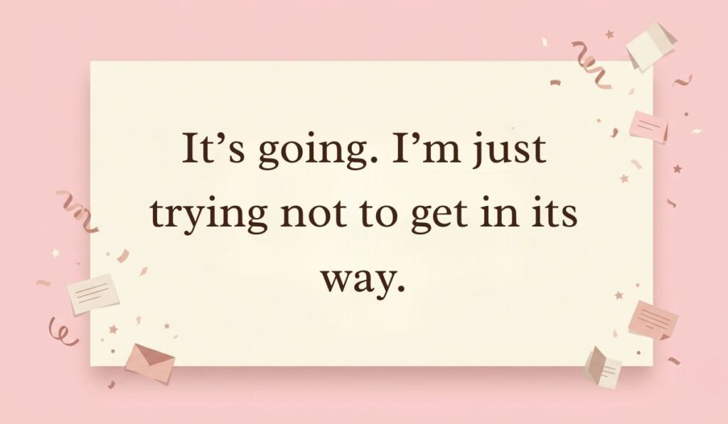 Pastel pink background with subtle confetti and mini envelopes displaying a casual response on how to reply to how's it going reading, "It’s going. I’m just trying not to get in its way."