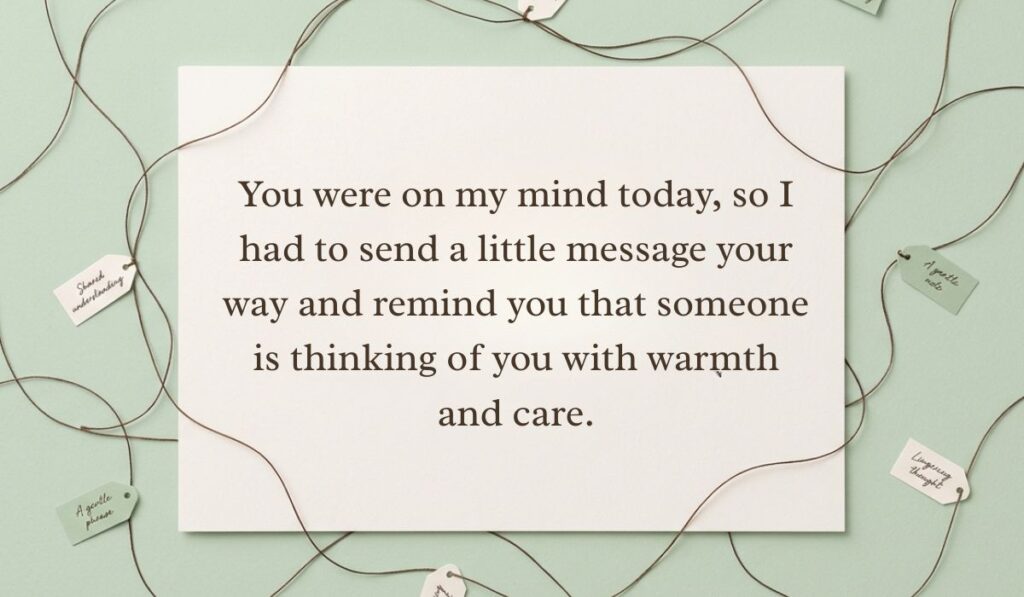 alt="Sage green background with a crisscrossed string network and small tags featuring a thinking of you message reading, 'You were on my mind today, so I had to send a little message your way and remind you that someone is thinking of you with warmth and care.'"