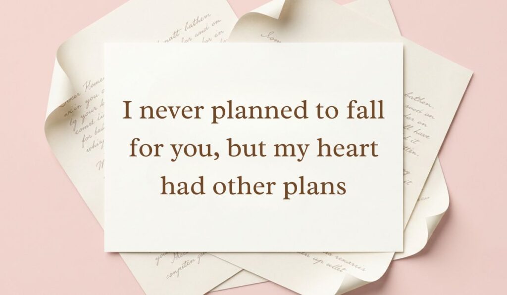 Soft pink backdrop framed with layered vintage paper presenting falling in love quotes reading, "I never planned to fall for you, but my heart had other plans"