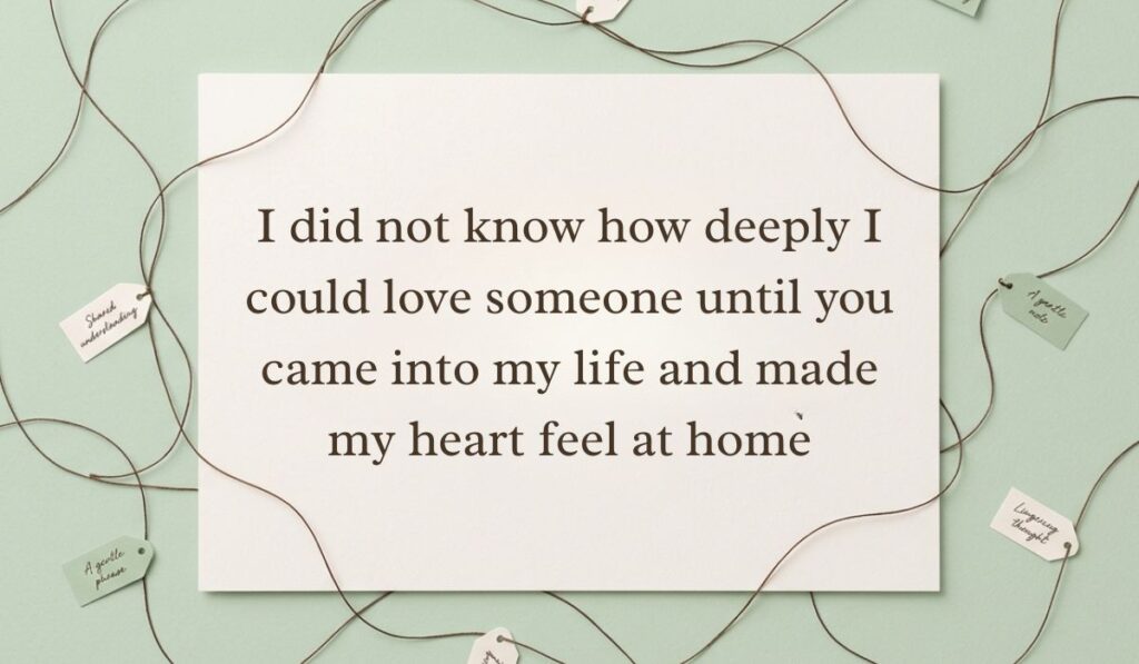 Light green surface framed by interconnected twine strings and small message tags featuring falling in love quotes stating, "I did not know how deeply I could love someone until you came into my life and made my heart feel at home"