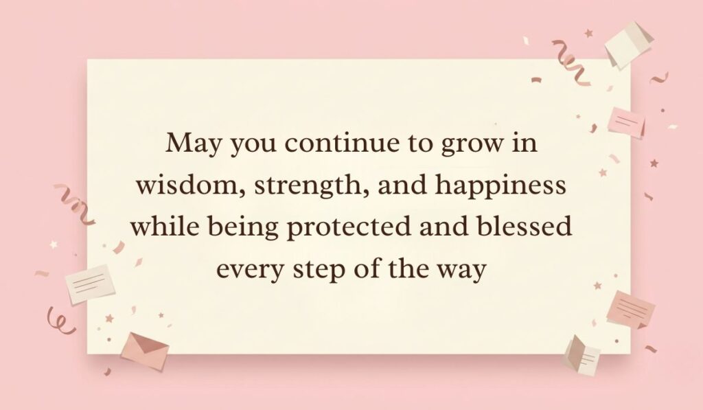 Soft pink background decorated with festive paper confetti, mini envelopes, and stars showcasing happy birthday blessings reading, "May you continue to grow in wisdom, strength, and happiness while being protected and blessed every step of the way"